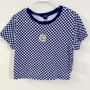 Black and white checkered shirt with smiling sunflower